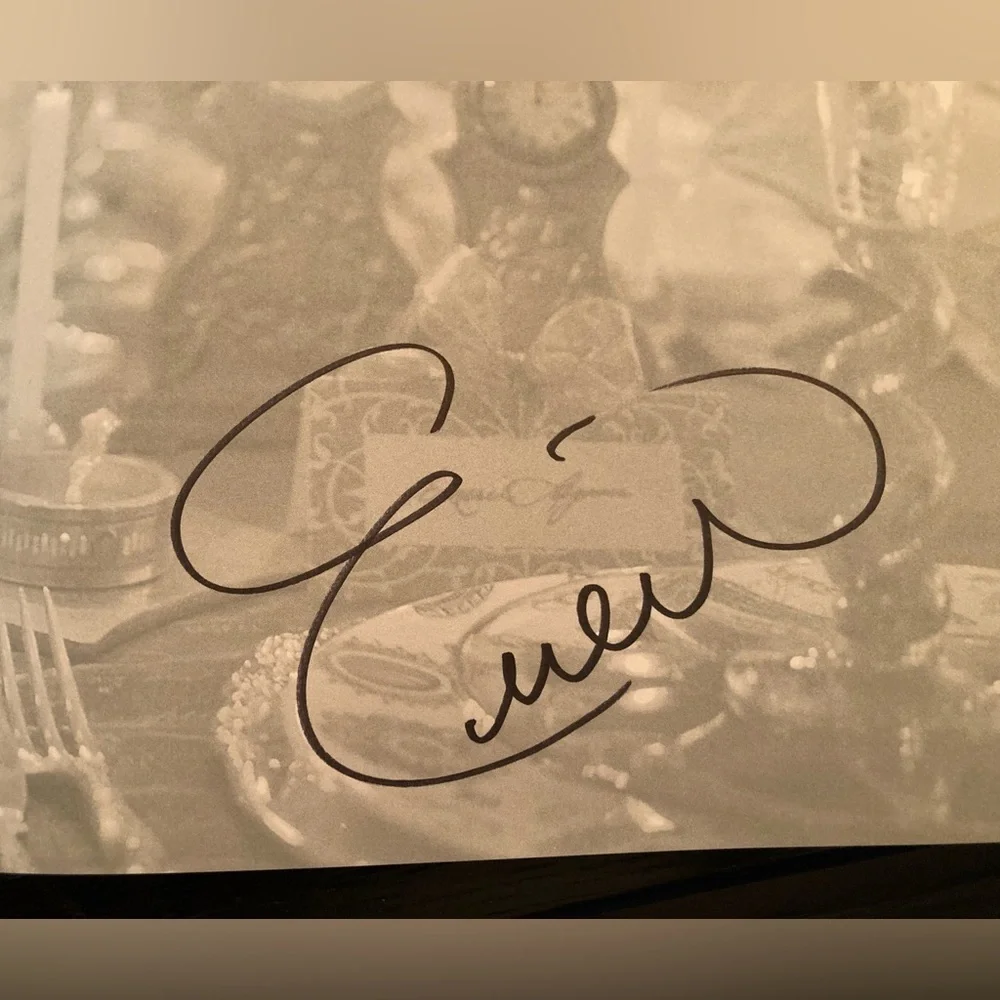 Emerils Creole Christmas autograph cookbook.